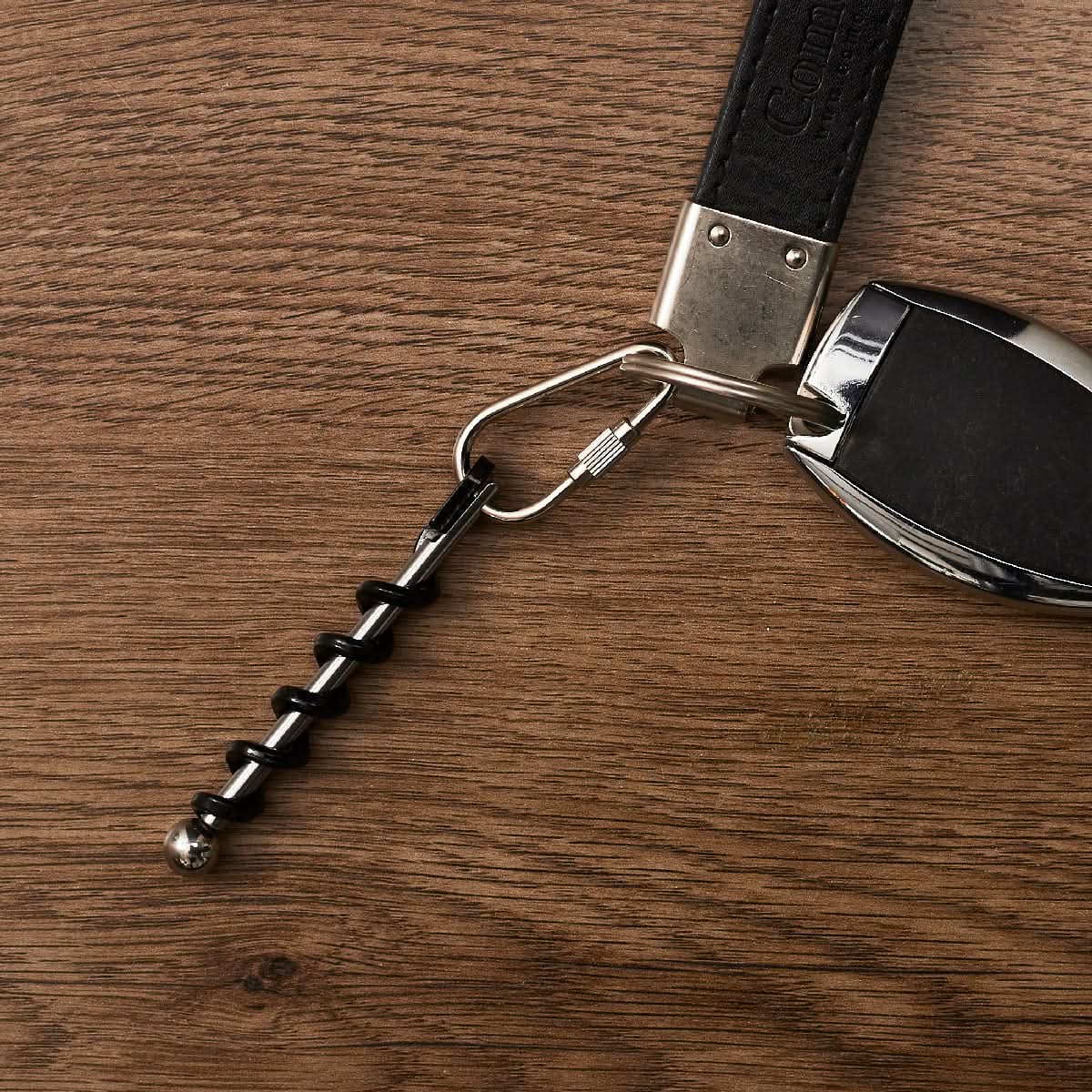 PORTE CLES TIRE BOUCHON